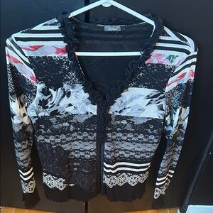 Women’s Elegant button down blouse with ruffle trim. Size 12